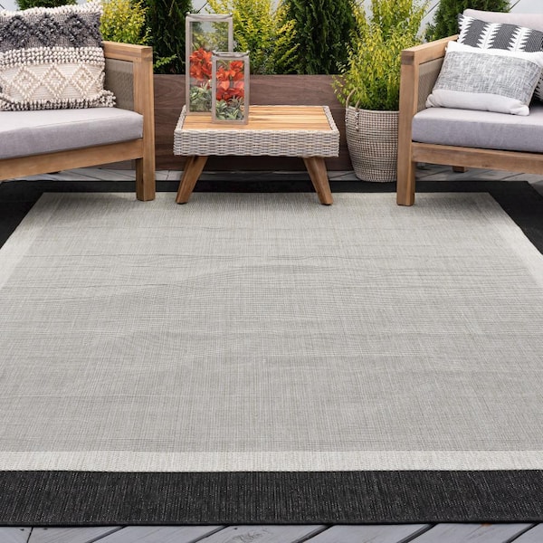 Eco Solid Border Black 9 ft. x 12 ft. Indoor/Outdoor Area Rug