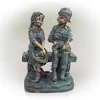 16 in. Tall Indoor/Outdoor Girl and Boy Sitting on Bench with Puppy Statue Yard Art Decoration