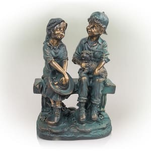 16 in. Tall Indoor/Outdoor Girl and Boy Sitting on Bench with Puppy Statue Yard Art Decoration