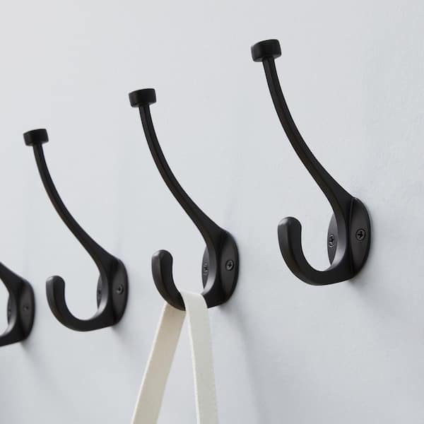 https://images.thdstatic.com/productImages/871f0ae7-bc4a-43f2-950e-6cc6f956be56/svn/matte-black-home-decorators-collection-hooks-64201-1f_600.jpg