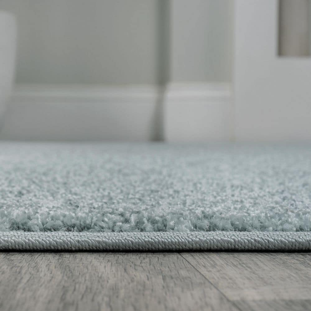 Light Blue Solid Synthetic 9' x 12' Reversible Area Rug