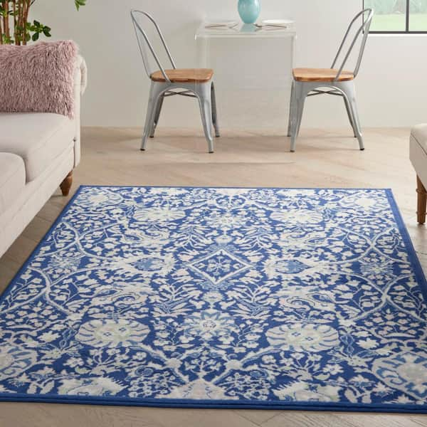 https://images.thdstatic.com/productImages/8730a79d-daeb-5a8c-aa98-68c3c3d45be4/svn/navy-multicolor-nourison-area-rugs-833327-e1_600.jpg