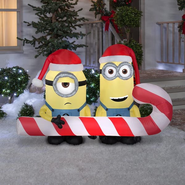 Gemmy 4 ft. Airblown-Minions Carrying Candy Cane-MD Scene 