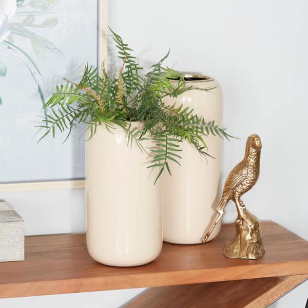 Litton Lane 13 in. H Cream Metal Decorative Vase