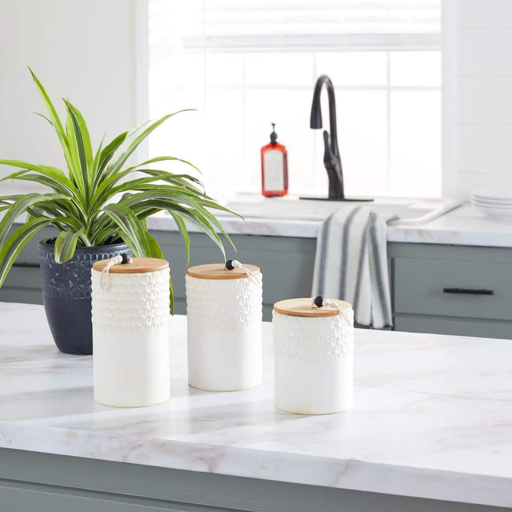 Charming White Ceramic Decorative Jar Trio with Wooden Lids