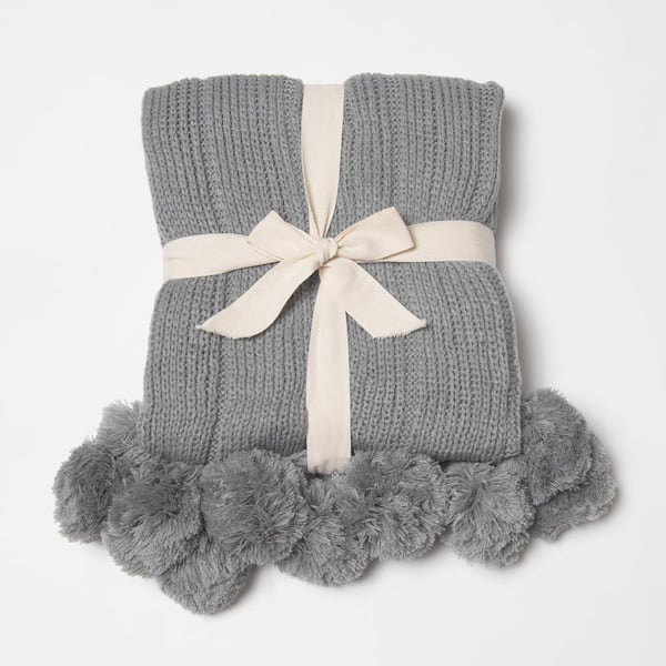 Grey throw blanket with pom poms hot sale