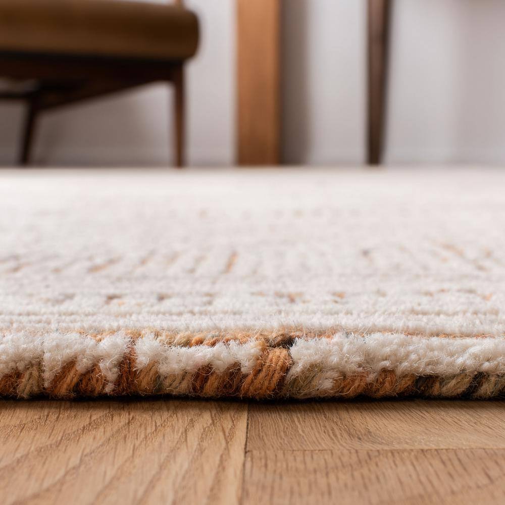 Ivory and Rust Abstract Wool 9' x 12' Area Rug