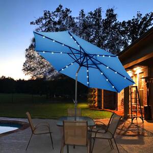 royal blue patio umbrella with solar lights