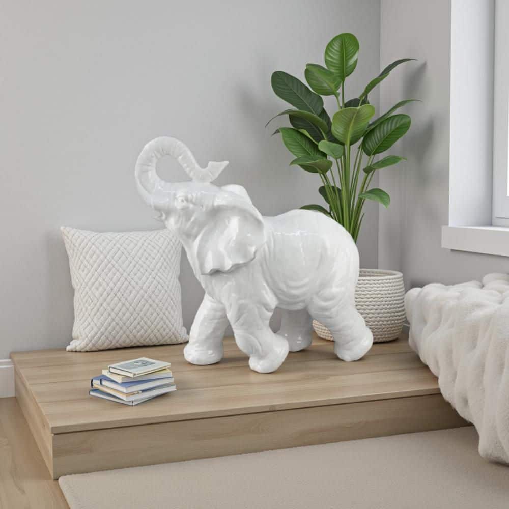 Benjara Morden White 7.75 in. x 17.5 in. Ceramic Elephant BM334867