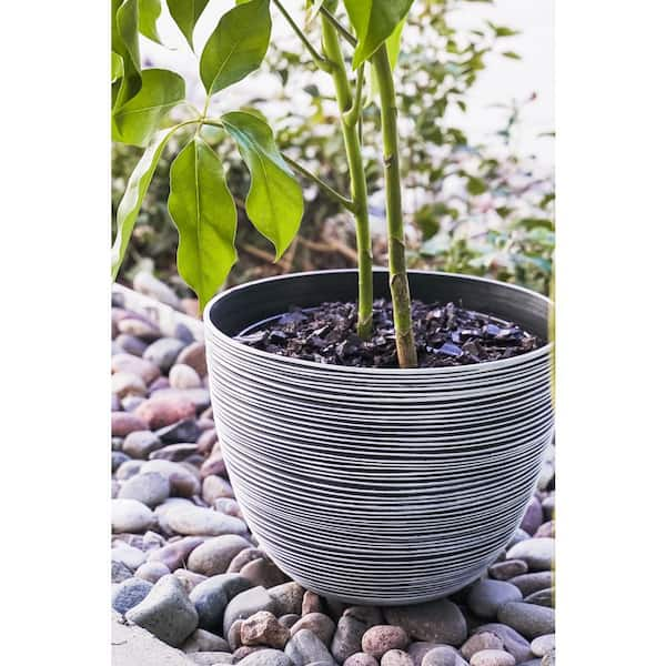 https://images.thdstatic.com/productImages/878b44ae-139f-44f9-87ef-9ce095cdf4c7/svn/white-xbrand-plant-pots-pl3417wt-4f_600.jpg