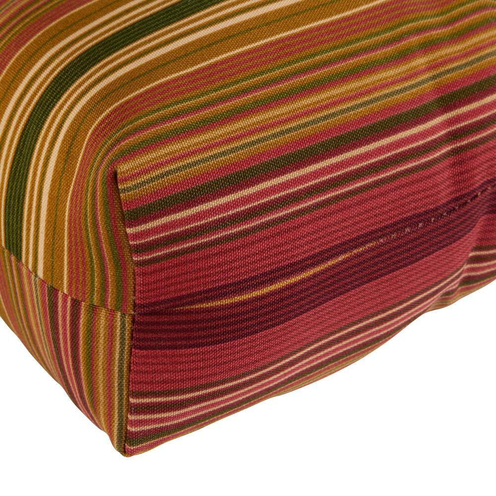 Close-up detail of the striped fabric pattern on a chair cushion.