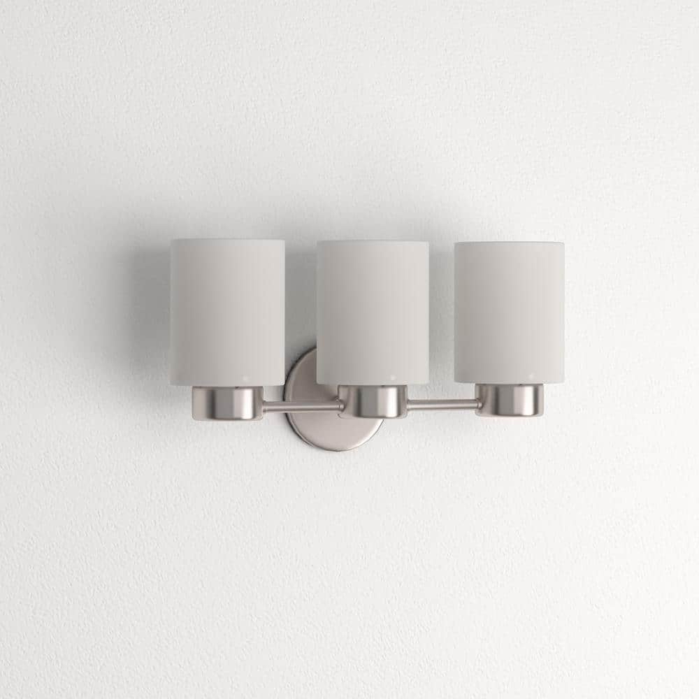 Elegant Brushed Nickel 3-Light Wall Sconce with Frosted Seeded Glass