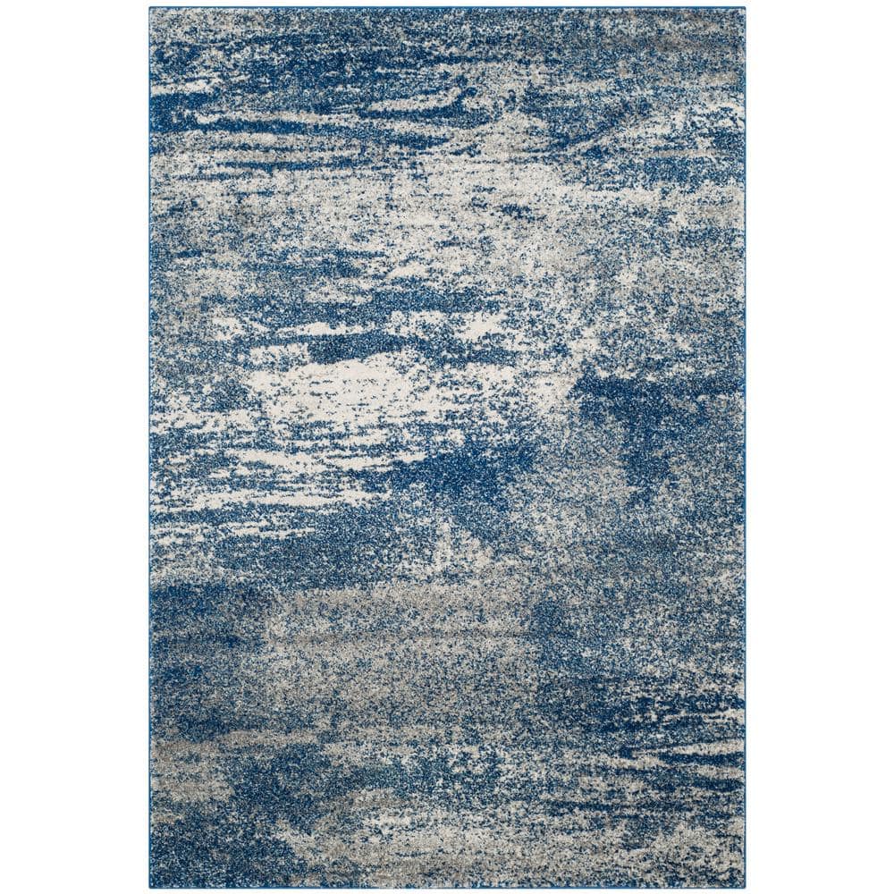 SAFAVIEH Evoke 7 ft. x 9 ft. Navy/Ivory Solid Area Rug EVK272A6 The Home Depot
