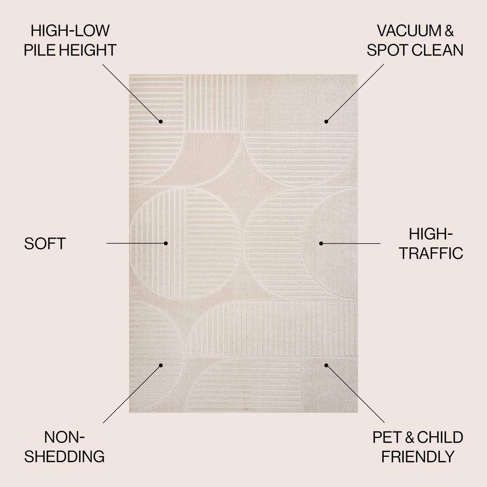 Ivory and Cream Geometric High-Low 8' x 10' Area Rug