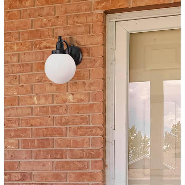 Eddystone 1-Light Matte Black Outdoor Wall Mount Sconce with White Opal Glass, Dusk to Dawn Sensor
