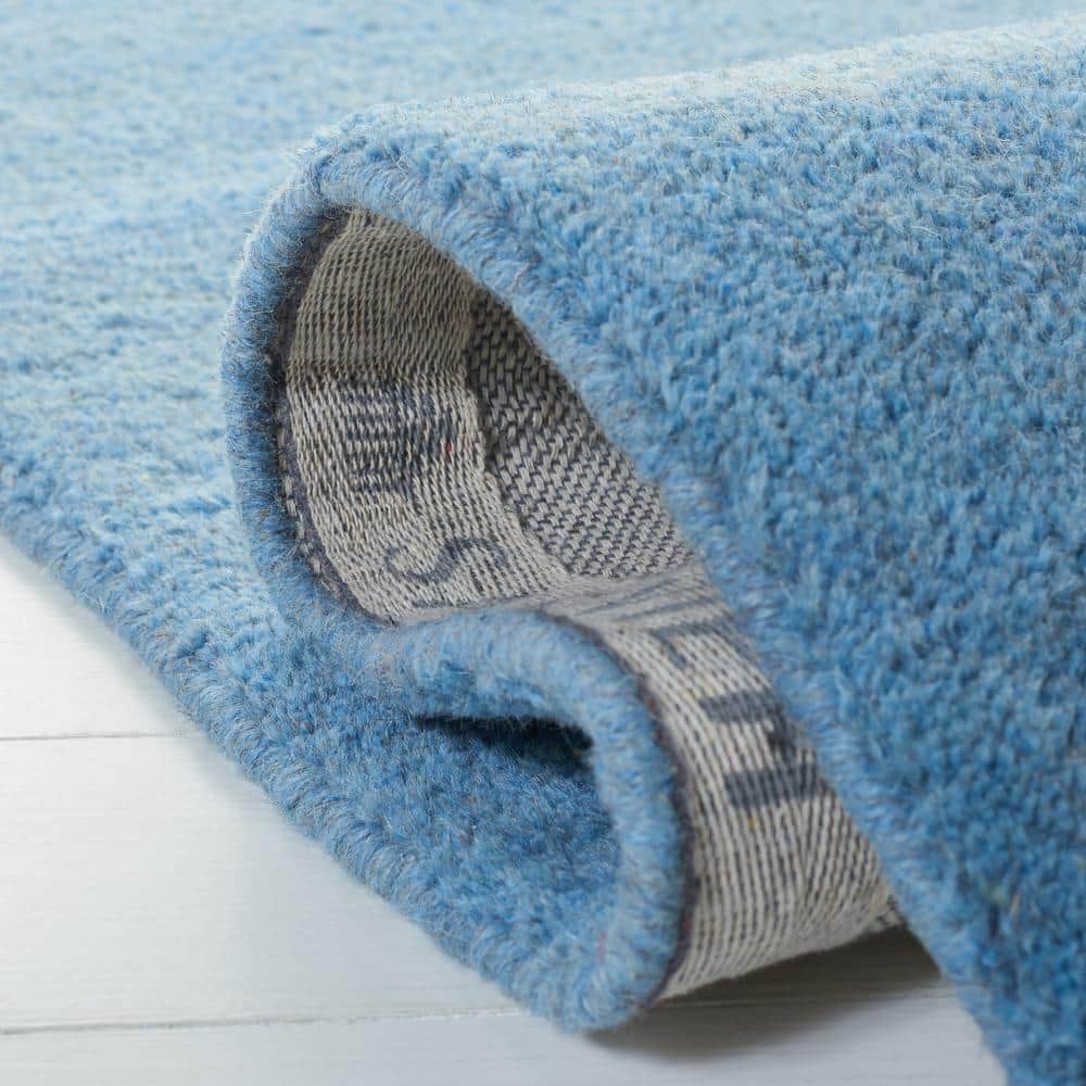 Handmade Coastal Blue Solid Wool Rectangular Accent Rug