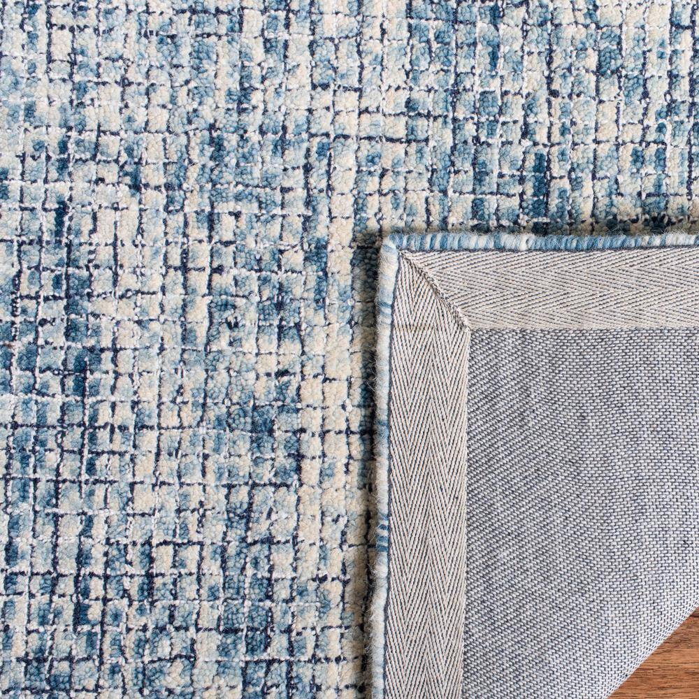 Ivory and Navy Abstract Wool Handmade Area Rug