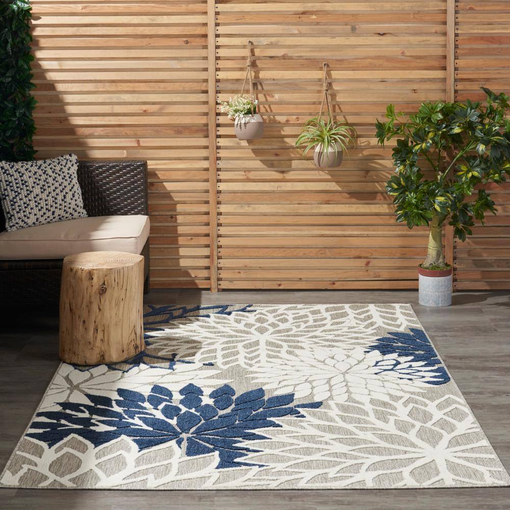Ivory/Navy Floral Synthetic 4' x 6' Easy-Care Area Rug