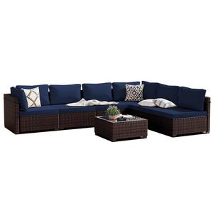 7-Piece Wicker Patio Conversation Seating Set with Navy Blue Cushions and Coffee Table