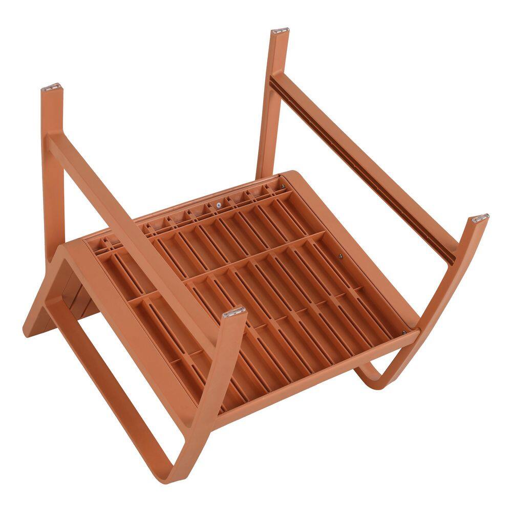 Outdoor sectional set consisting of a chair and a matching table.