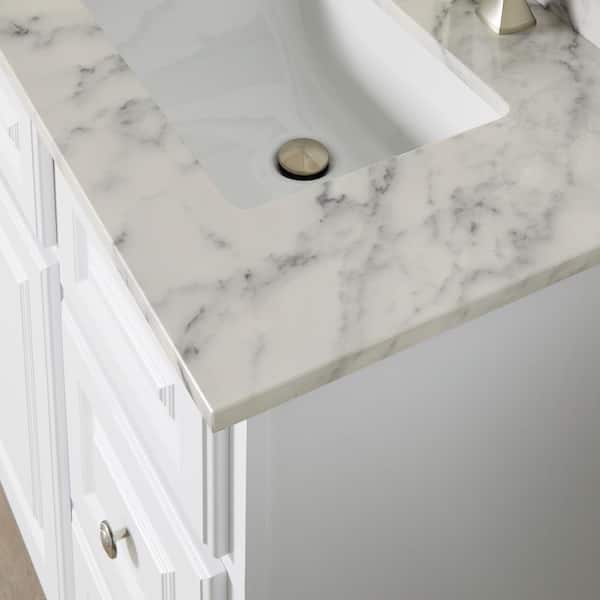 61 in. W x 22 in. D Engineered Marble Vanity Top in Snowstorm with White Double Trough Sinks 61 in. W x 22 in. D Engineered Marble Vanity Top in Snowstorm with White Double Trough Sinks