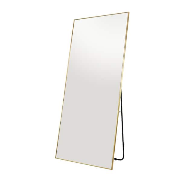 CosmoLiving by Cosmopolitan 31 in. x 69 in. Gold Metal Shiny Floor Mirror with Stand