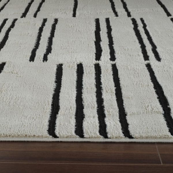 5 ft. x 8 ft. Cream and Black Abstract Worn Faded Area Rug