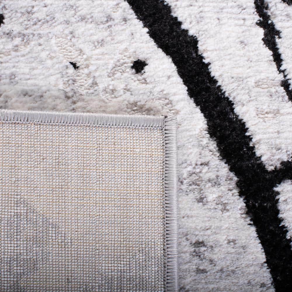 Handmade Round Gray and Black Abstract Synthetic Rug