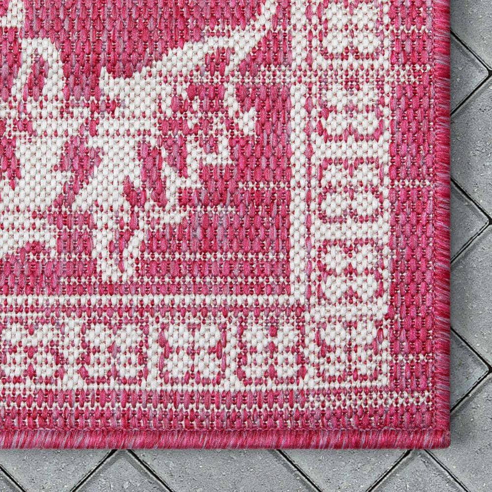 Fuchsia and White Synthetic 5' x 7' Reversible Area Rug