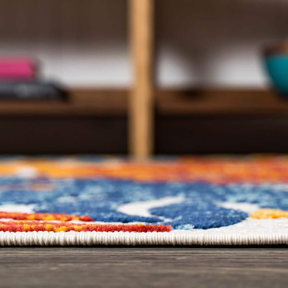 Cream and Orange Palm Leaves Synthetic 4' x 6' Area Rug
