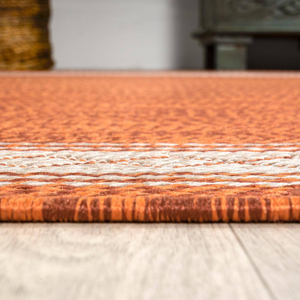 Lucia Cream and Orange Synthetic Indoor/Outdoor Area Rug
