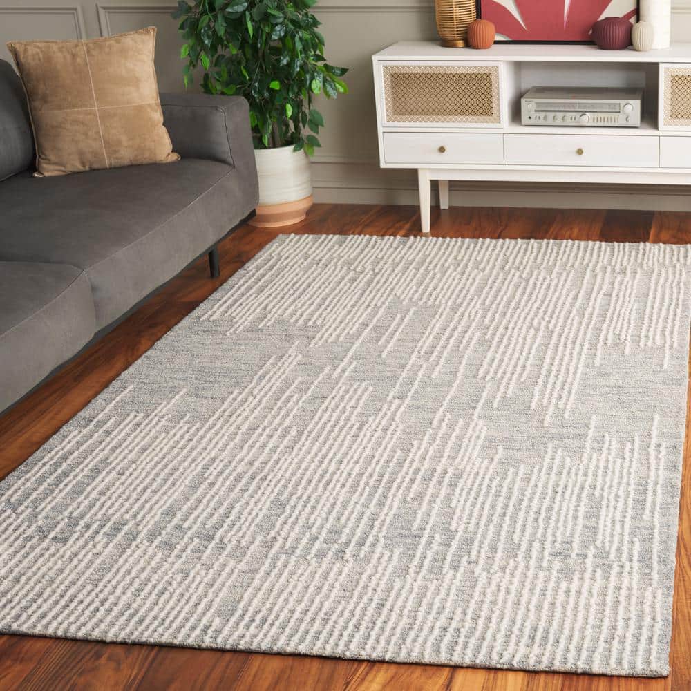 Handmade Light Grey and Ivory Wool Tufted Medium Rectangle Rug