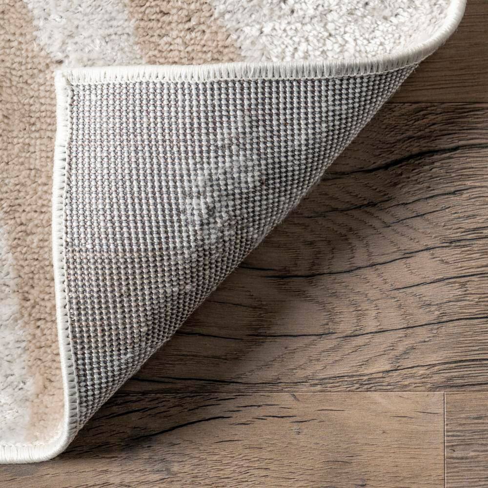 Blush and Ivory Abstract Synthetic 9' x 12' Area Rug