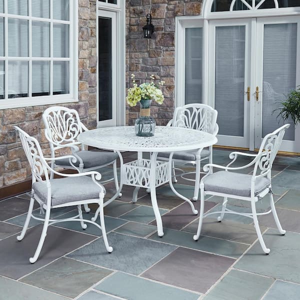 HOMESTYLES Capri White 48 in. 5-Piece Cast Aluminum Round Outdoor Dining Set with Gray Cushions