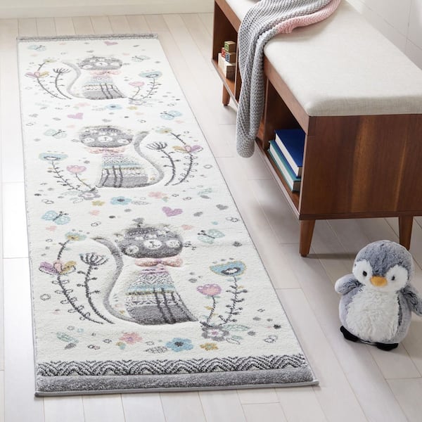 Carousel Kids 2 ft. x 6 ft. Ivory/Pink Animal Print Runner Rug