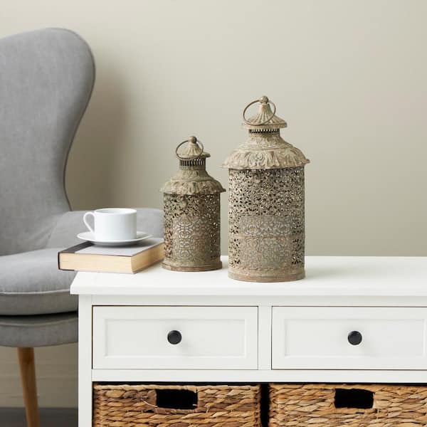Litton Lane Brown Metal Distressed Vintage Inspired Ornate Scroll Candle Lantern Set of 2