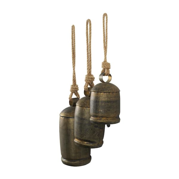 Litton Lane Gold Metal Tibetan Inspired Cylindrical Decorative Cow