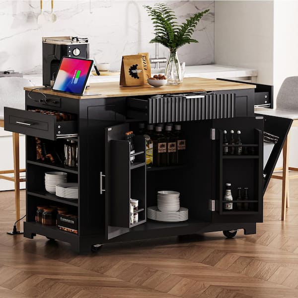 Nestfair Black Wood 48.5 in. Rolling Kitchen Island with Trash Can Storage Cabinet, Power Outlet, 3-Drawers and 5-Wheels