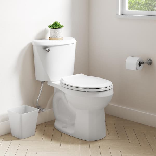 Reliant 12 in. Rough In 2-Piece 1.28 GPF Single Flush Round Toilet with Slow Close Seat in White