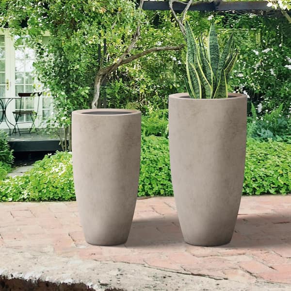 https://images.thdstatic.com/productImages/88be7cae-5470-4e40-bd9f-97e6f869c7db/svn/concrete-plant-pots-pa099s2-8021-2-64_600.jpg