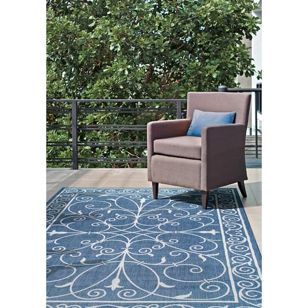 https://images.thdstatic.com/productImages/88d2d8df-3b52-4dde-8cf0-d82aab18f174/svn/blue-nuloom-outdoor-rugs-owdn03c-86013-e1_600.jpg