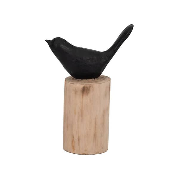 Liv & Skye Black 6 in. x 9 in. Wood Bird Perched On Log Figurine