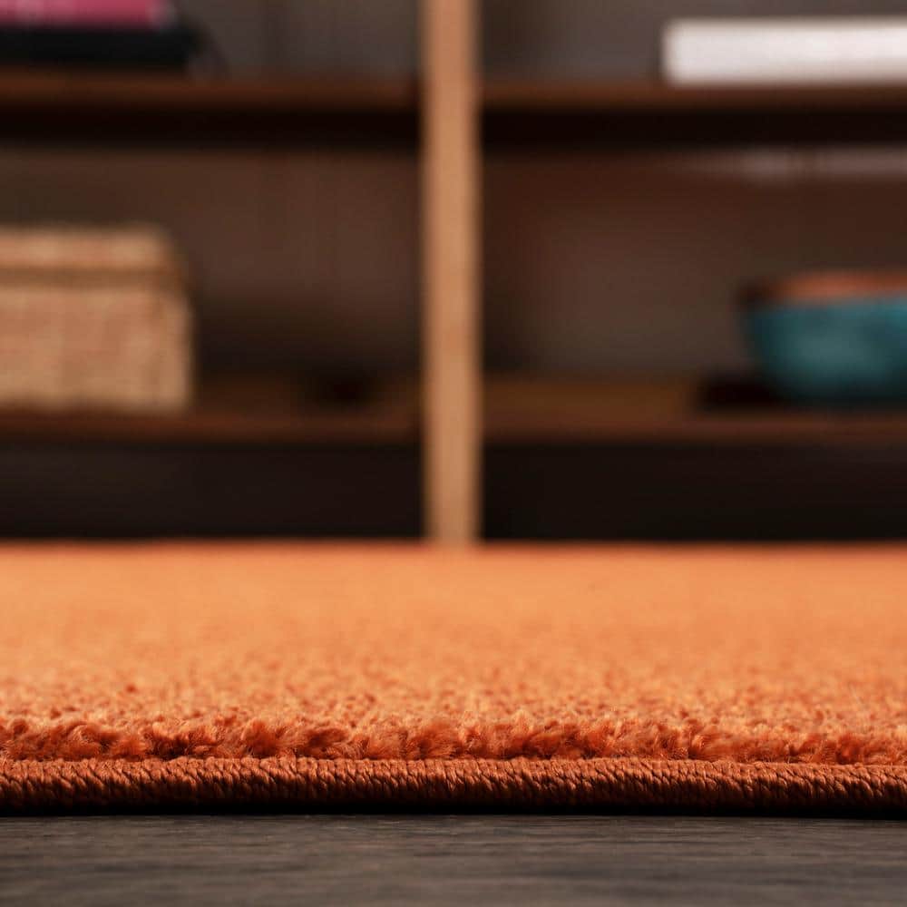 Haze Solid Orange 5'3" Square Synthetic Area Rug