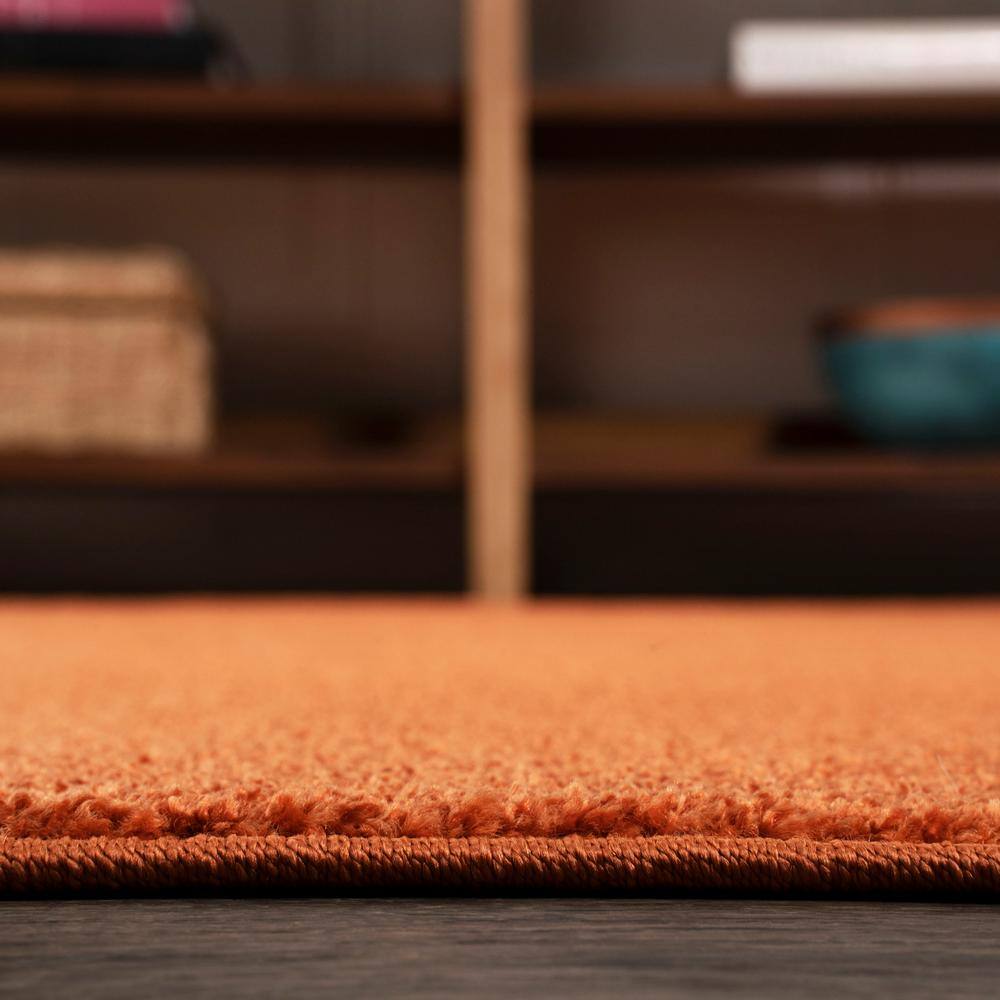 Haze Solid Orange 7' Square Synthetic Area Rug