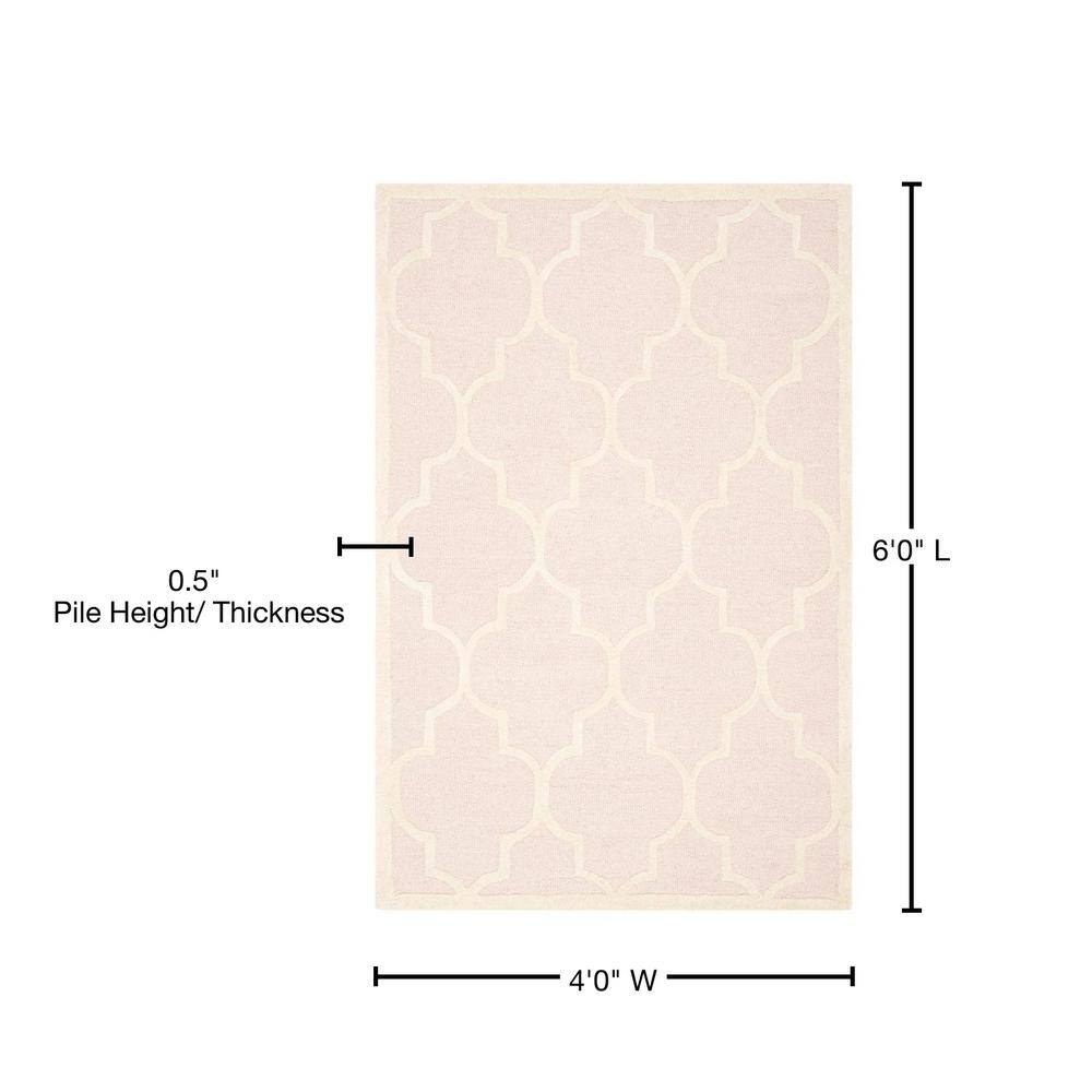 Light Pink and Ivory Hand-Tufted Wool 4' x 6' Area Rug
