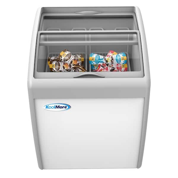 Small chest freezer that rolls out underneath countertop. Locks in