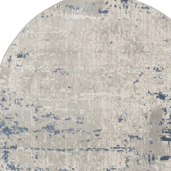 5' X 8' Gray and Ivory Abstract Power Loom Area Rug