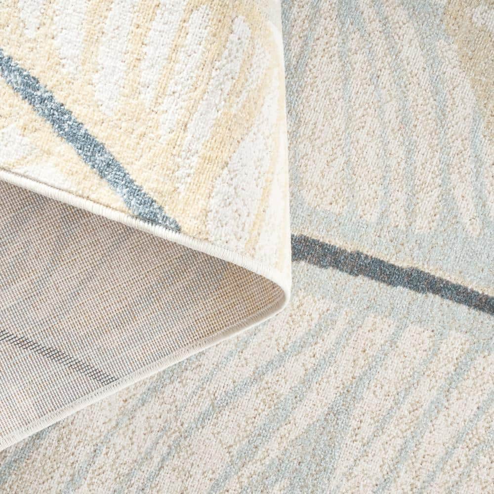 Ivory and Multicolor Synthetic Palm Fronds Indoor/Outdoor Rug