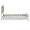 White wooden bed frame with slatted base and headboard.