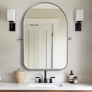 24 in. W x 35 in. H Arched Metal Framed Pivoted Bathroom Wall Vanity Mirror Round Corners in White
